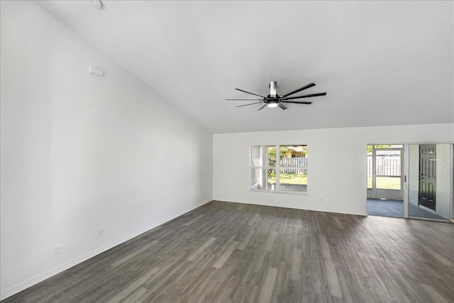 unfurnished living room with a ceiling fan, vaulted ceiling, baseboards, and dark wood-style flooring