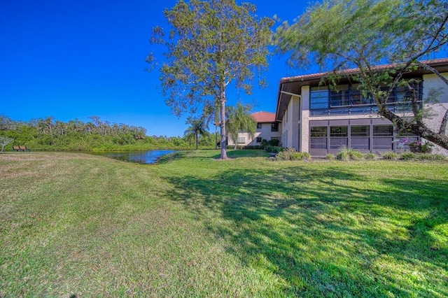 view of yard with a water view