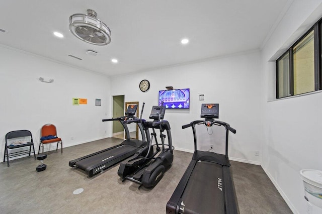 workout area featuring visible vents, recessed lighting, baseboards, and ornamental molding