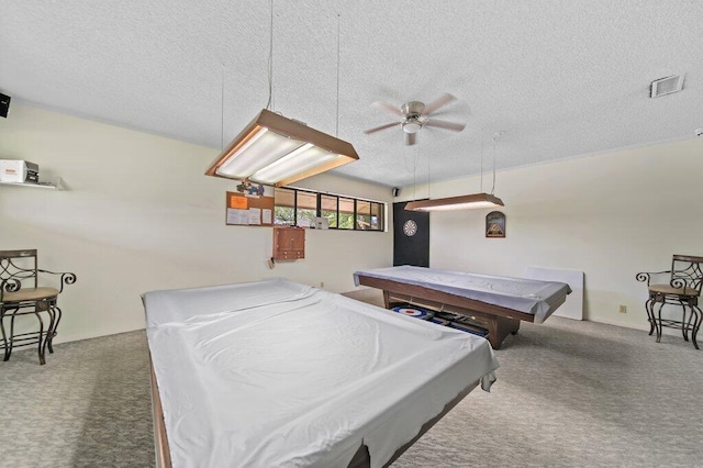 rec room with visible vents, carpet floors, ceiling fan, pool table, and a textured ceiling