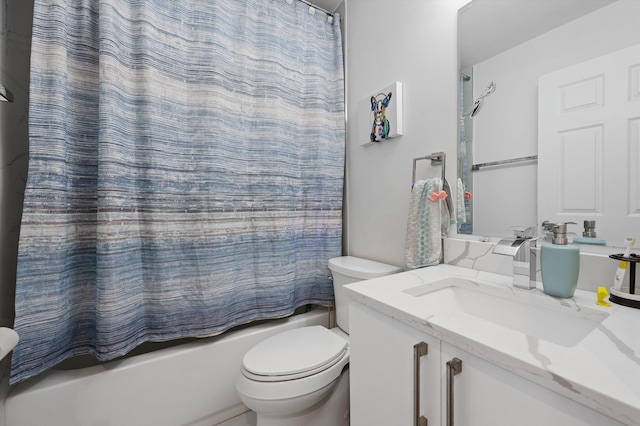 full bath with vanity, toilet, and shower / tub combo