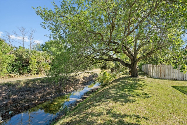 view of yard featuring fence