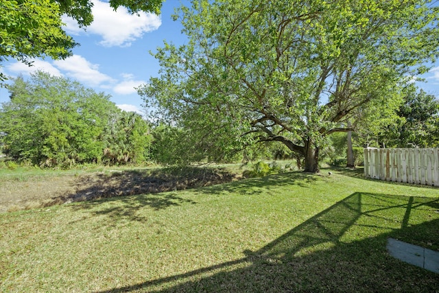 view of yard with fence