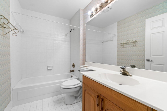 bathroom with wallpapered walls, toilet, bathing tub / shower combination, tile patterned floors, and vanity