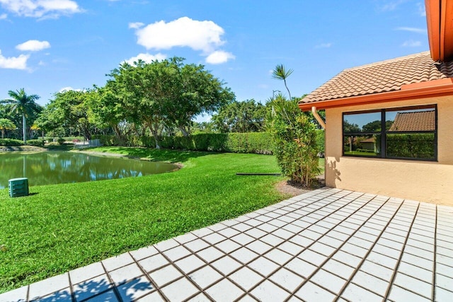 view of patio / terrace with a water view