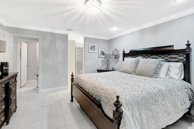 bedroom featuring visible vents, a textured ceiling, baseboards, and ornamental molding