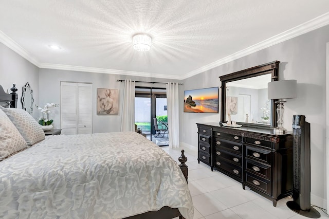 bedroom featuring a closet, crown molding, light tile patterned floors, baseboards, and access to exterior