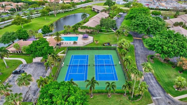 bird's eye view with a residential view and a water view