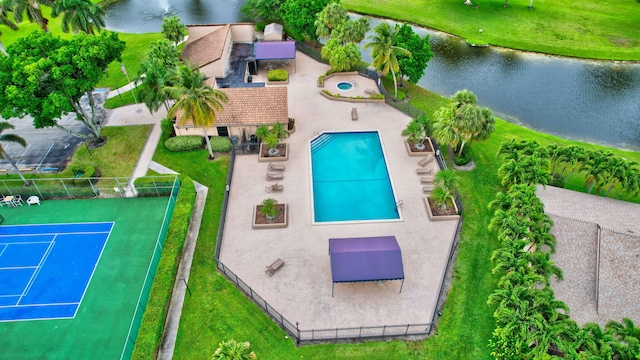 birds eye view of property featuring a water view