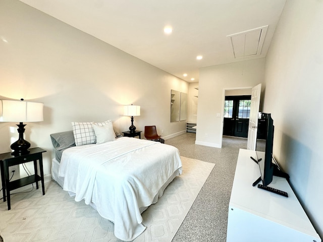 bedroom with attic access, recessed lighting, and baseboards