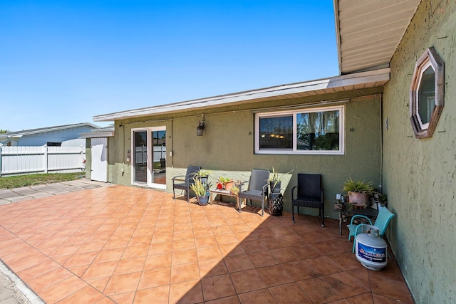 view of patio with fence