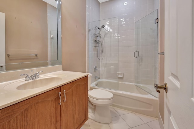 full bathroom featuring tile patterned flooring, vanity, toilet, and washtub / shower combination