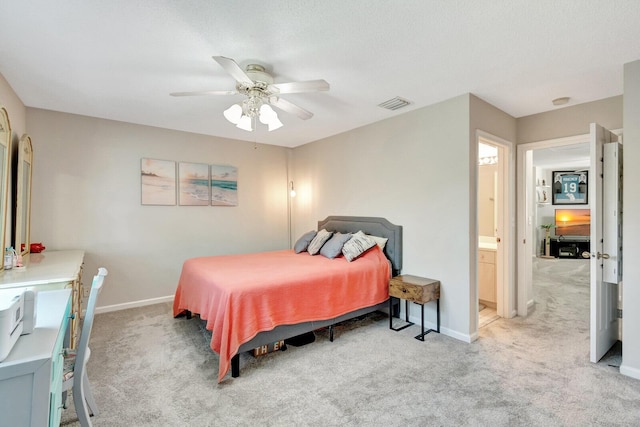 bedroom with visible vents, light colored carpet, a ceiling fan, and baseboards