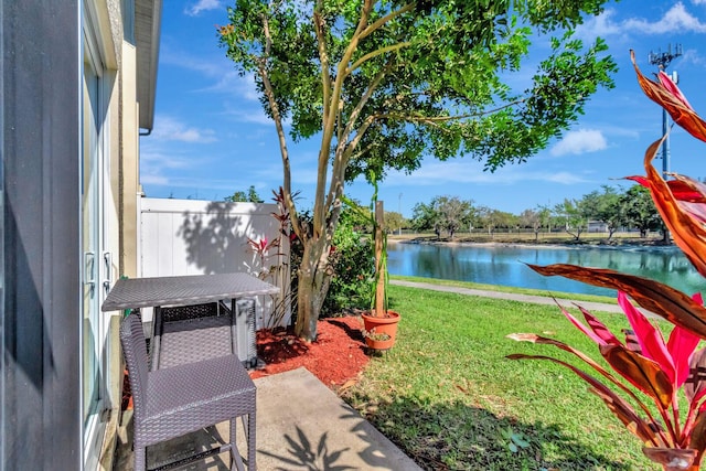 view of yard with a water view