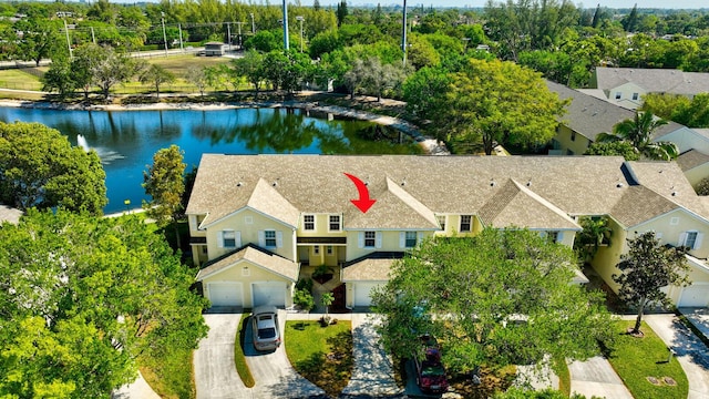 aerial view featuring a residential view and a water view