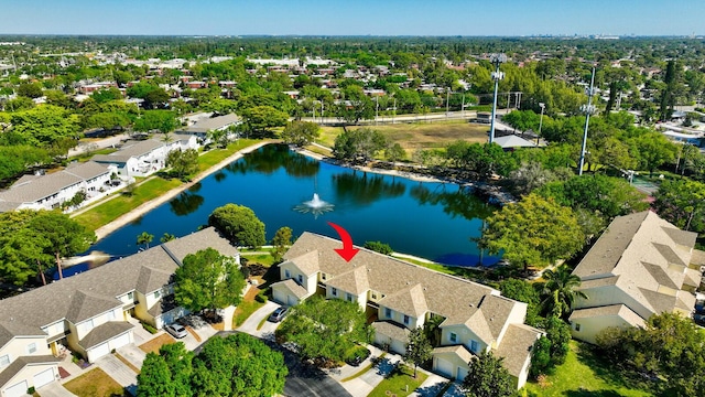 bird's eye view with a residential view and a water view