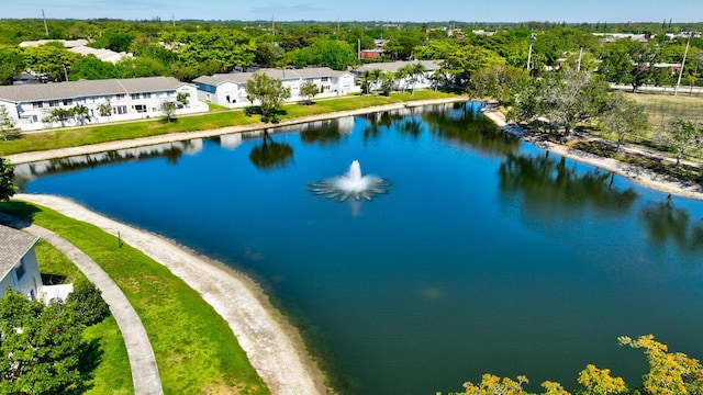 bird's eye view with a residential view and a water view