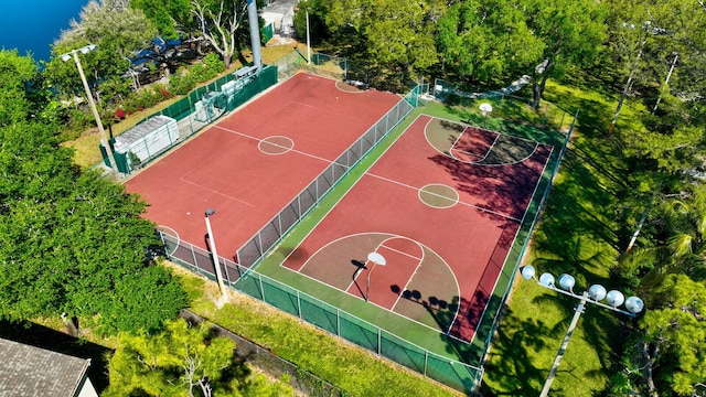 view of sport court featuring community basketball court and fence