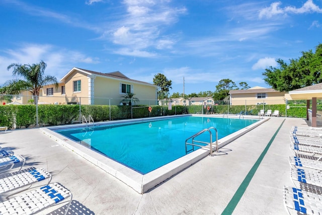 pool featuring fence