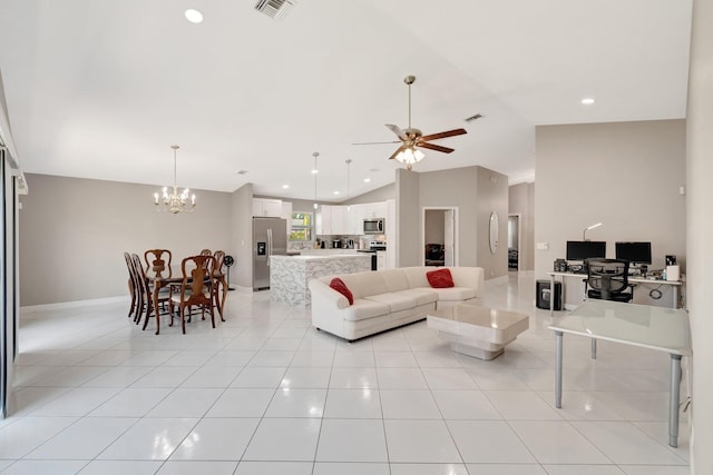 living room featuring visible vents, lofted ceiling, light tile patterned flooring, and ceiling fan with notable chandelier