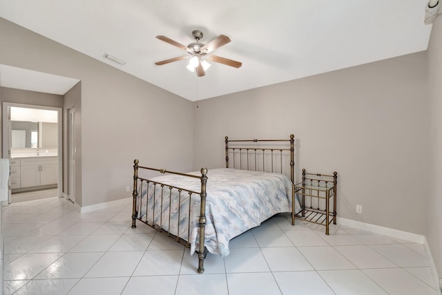 bedroom featuring light tile patterned flooring, visible vents, a ceiling fan, and baseboards