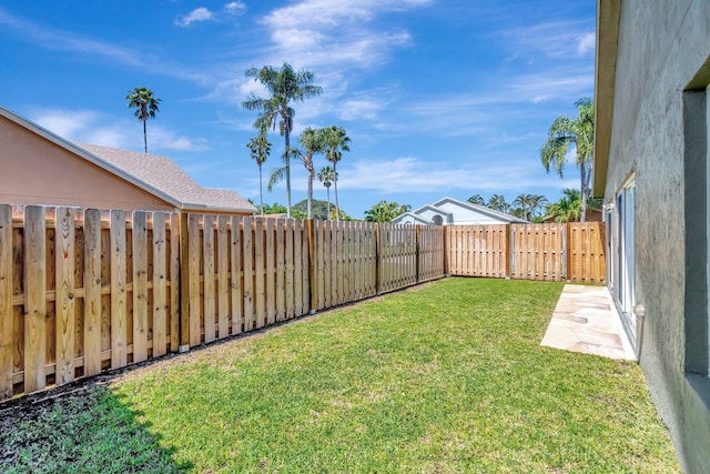 view of yard featuring a fenced backyard