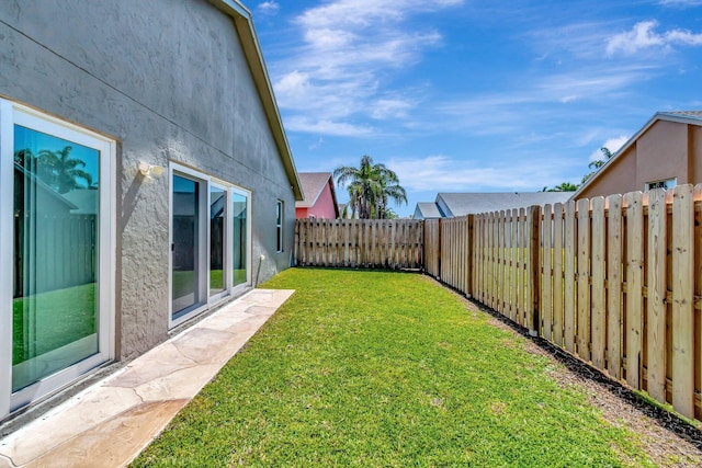 view of yard featuring a fenced backyard