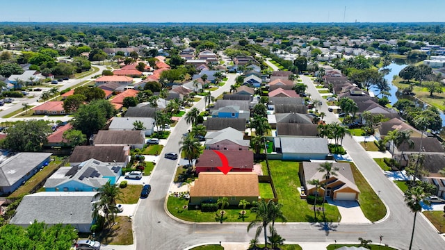 birds eye view of property with a residential view