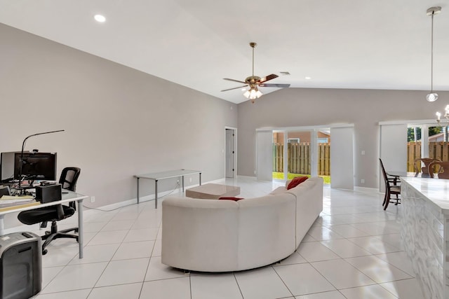 living room with lofted ceiling, light tile patterned floors, and a wealth of natural light