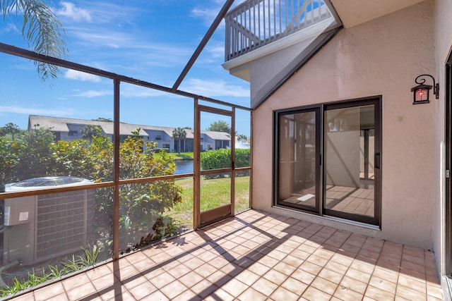 unfurnished sunroom featuring a healthy amount of sunlight