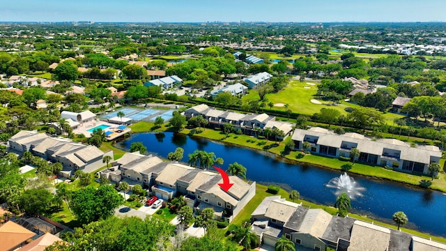 drone / aerial view with a residential view and a water view