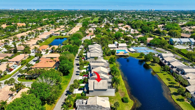 birds eye view of property with a residential view and a water view