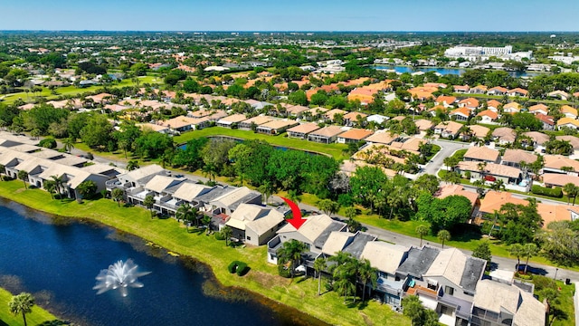 aerial view with a residential view and a water view