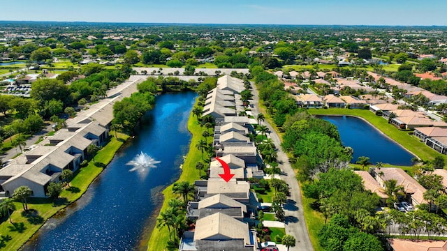 aerial view featuring a residential view and a water view