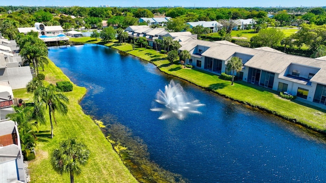 bird's eye view featuring a water view and a residential view