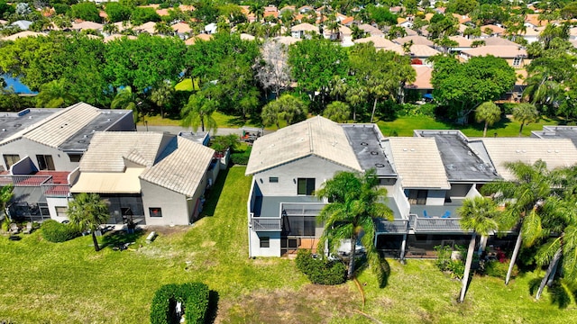 birds eye view of property with a residential view