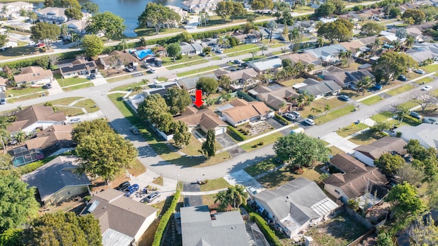 aerial view with a residential view and a water view