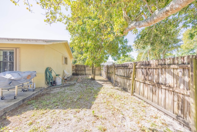 view of yard featuring a fenced backyard