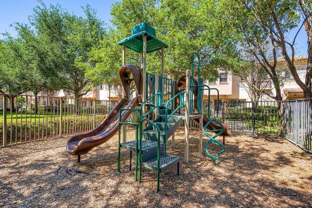 community jungle gym with fence
