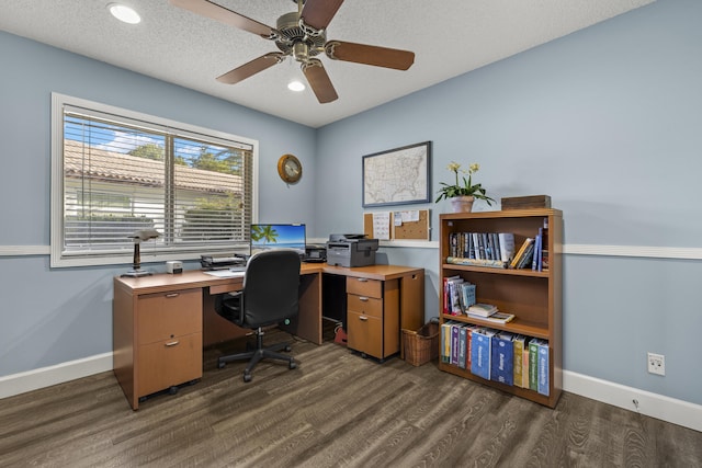 office featuring dark wood-type flooring, baseboards, recessed lighting, a textured ceiling, and a ceiling fan