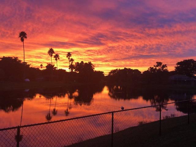 water view featuring fence