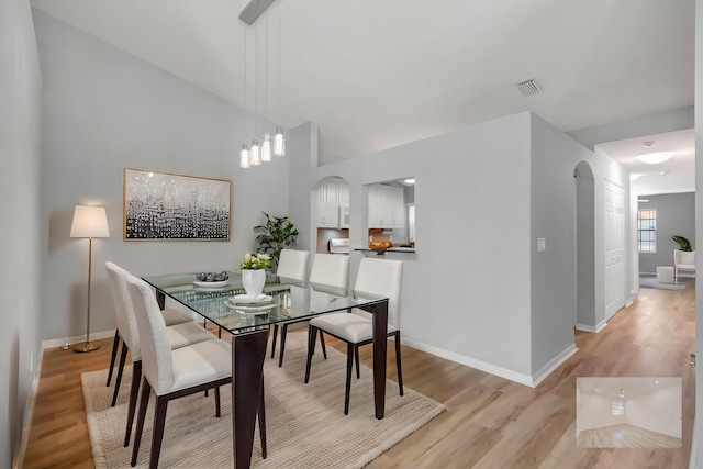 15443 Floral Club Rd, Delray Beach, FL 33484 - dining room featuring visible vents, baseboards, and light wood-style floors