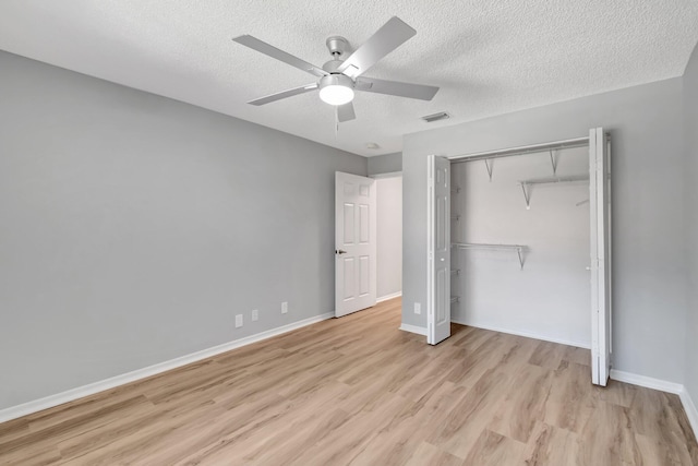 15443 Floral Club Rd, Delray Beach, FL 33484 - unfurnished bedroom featuring a closet, visible vents, light wood-type flooring, and baseboards