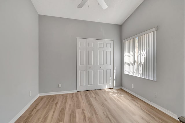 15443 Floral Club Rd, Delray Beach, FL 33484 - unfurnished bedroom featuring baseboards, light wood-type flooring, a closet, and ceiling fan