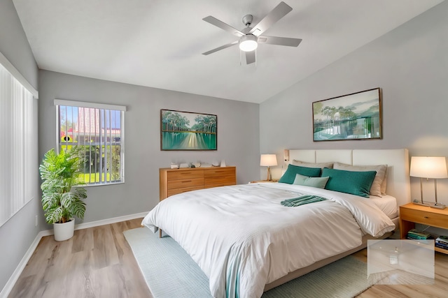 15443 Floral Club Rd, Delray Beach, FL 33484 - bedroom featuring ceiling fan, baseboards, lofted ceiling, and wood finished floors