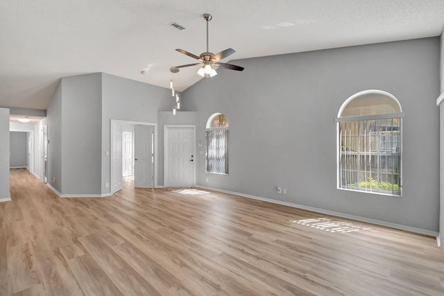 15443 Floral Club Rd, Delray Beach, FL 33484 - unfurnished living room featuring visible vents, baseboards, light wood-style flooring, and a ceiling fan