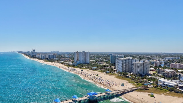 bird's eye view featuring a view of city, a view of the beach, and a water view