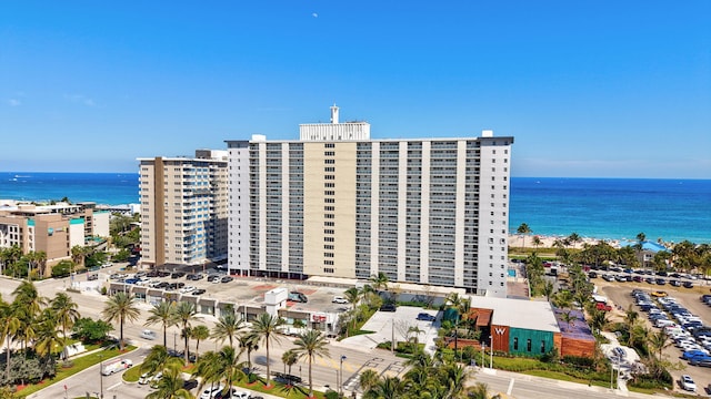 view of property featuring a view of city and a water view