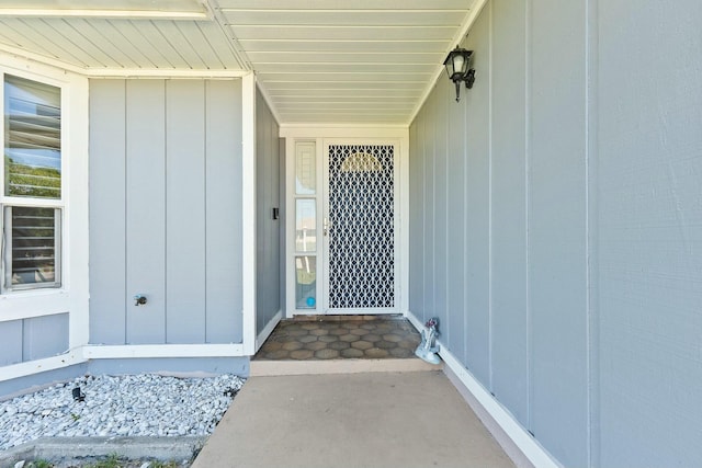 property entrance with board and batten siding