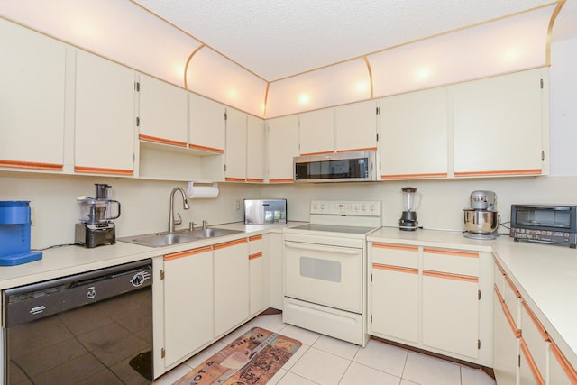 kitchen with white range with electric cooktop, a sink, stainless steel microwave, black dishwasher, and a textured ceiling